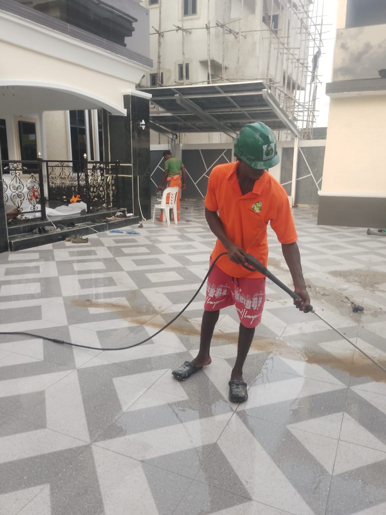 High-pressure compound washing in progress